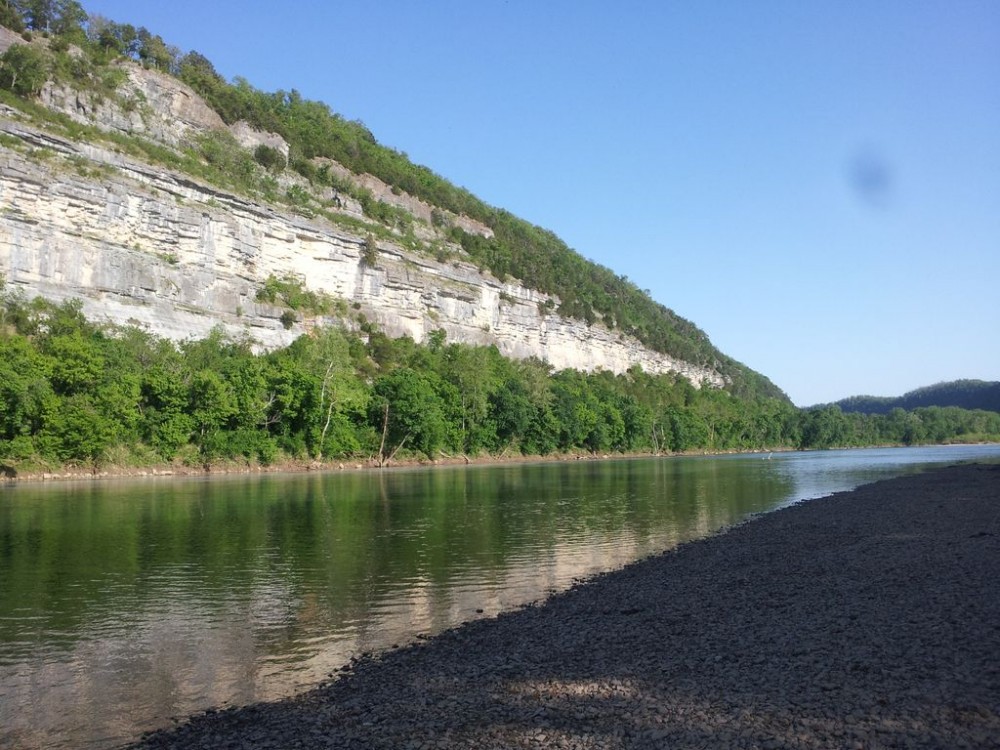 Mountain View vacation rental with Handford Bluff on the river behind the cabin